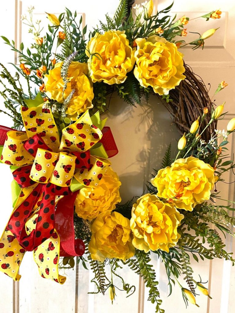 Yellow flowers with ladybug print ribbon